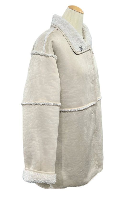 Beige coat on a mannequin in a store setting