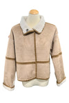 Beige jacket with white collar on a mannequin in a store setting
