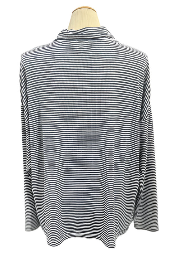 Black and white striped shirt on a mannequin in a store setting
