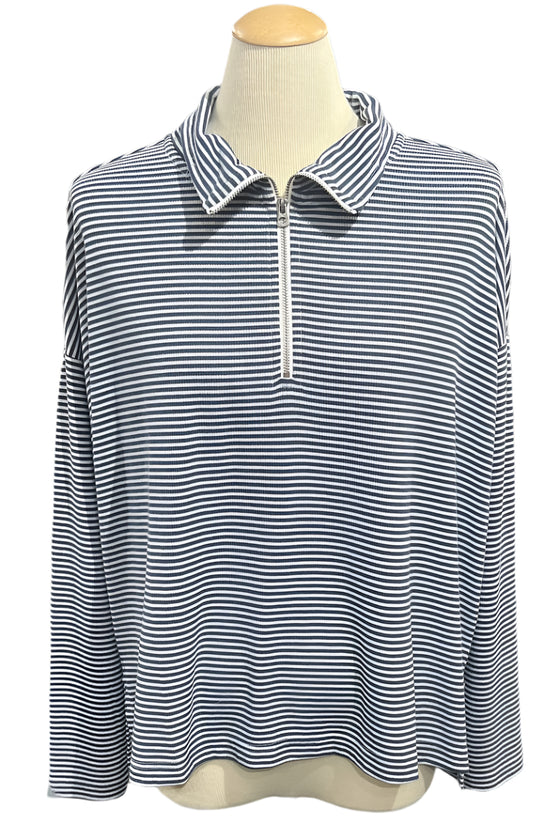 Striped shirt on a mannequin in a store setting