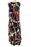Colorful abstract patterned dress on a mannequin against a white background