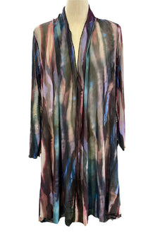  Multicolored scarf on a mannequin against a white background