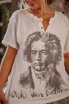 Person wearing a white t-shirt with a printed portrait and 'Ludwig van Beethoven' text.
