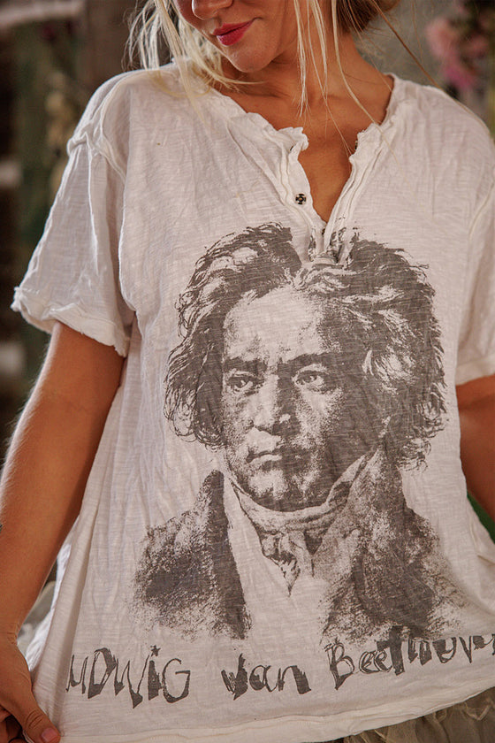 Person wearing a white t-shirt with a printed portrait and 'Ludwig van Beethoven' text.