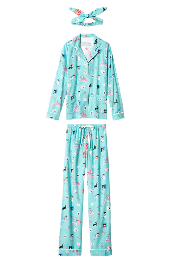 Teal pajama set with animal print on a light gray background