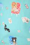Pattern of dogs and playing cards on a blue background