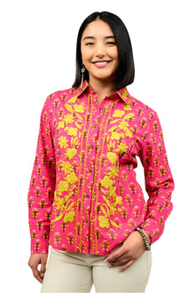  Woman wearing a pink floral shirt against a white background