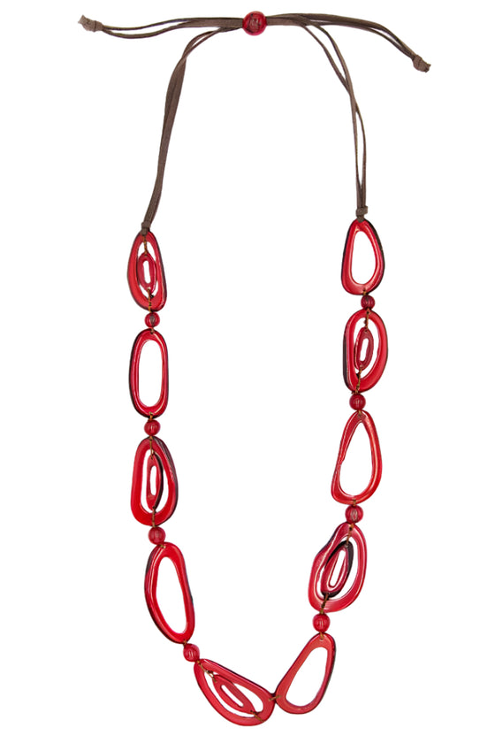Red necklace with brown cord on a white background