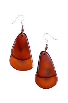  Pair of amber-colored teardrop earrings on a white background